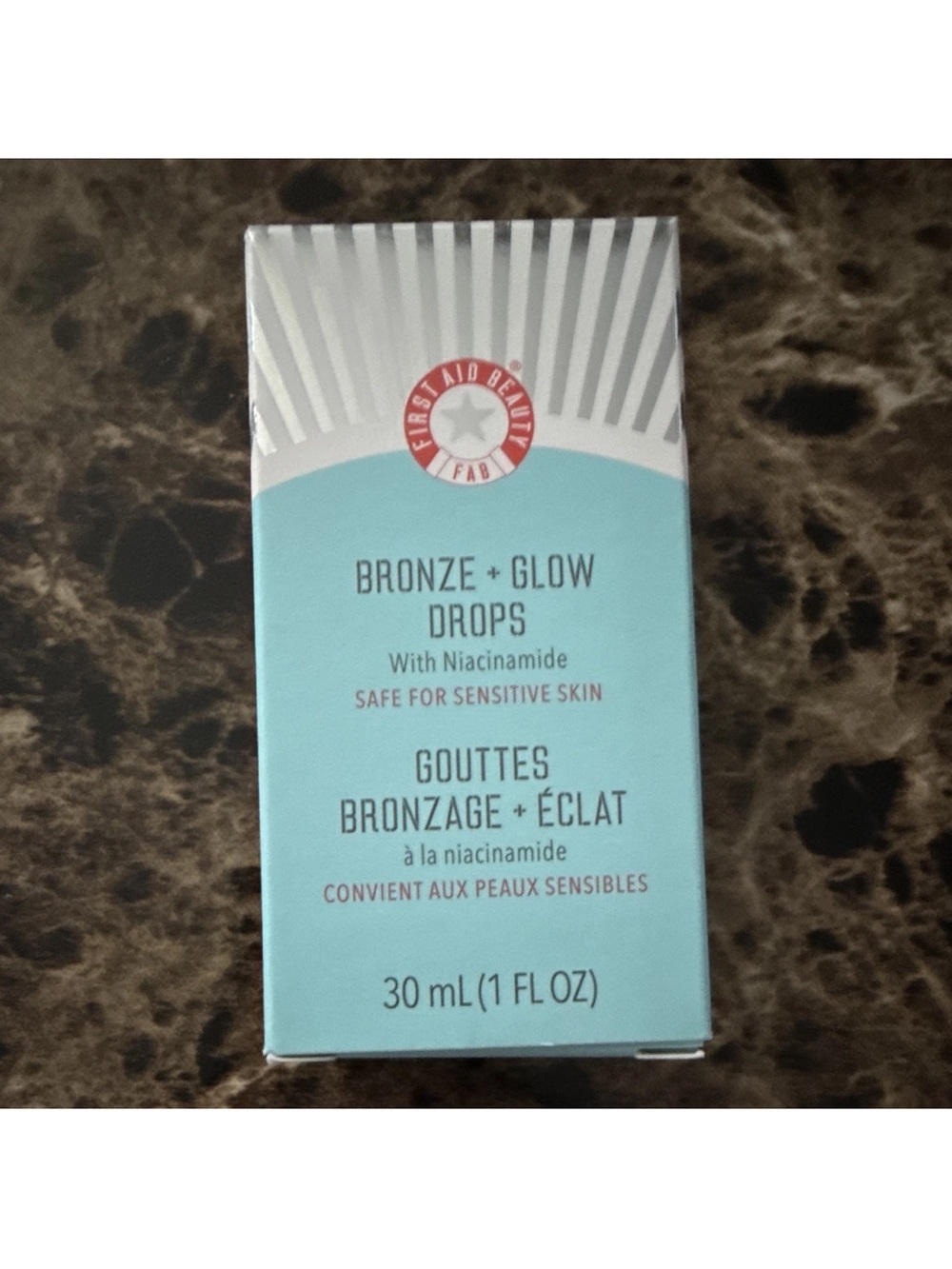 First Aid Beauty Bronze + Glow Drops Aqua and White Packaging
